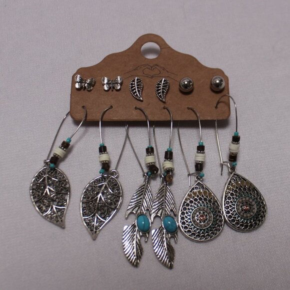 The Studs and Three Dangle Pairs of Earrings - Picture 1 of 7